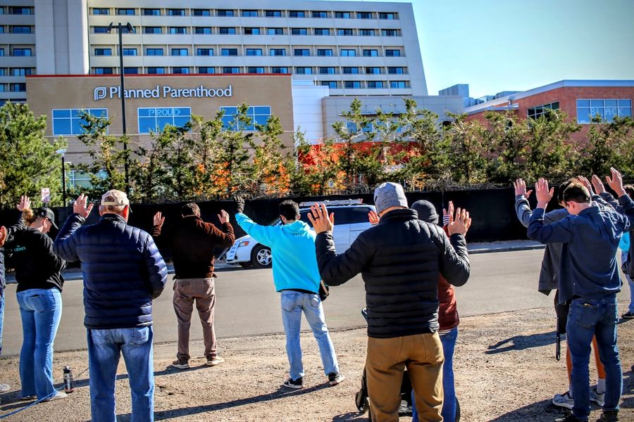 Group praying outside Planned Parenthood, November 2025