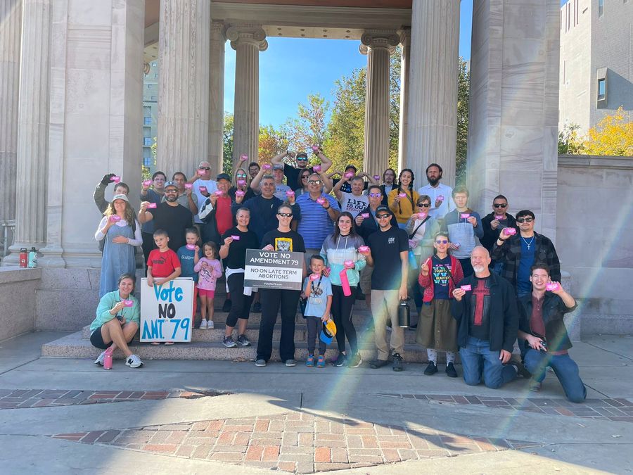 Group protesting Amendment 79 in downtown Denver, October 2024