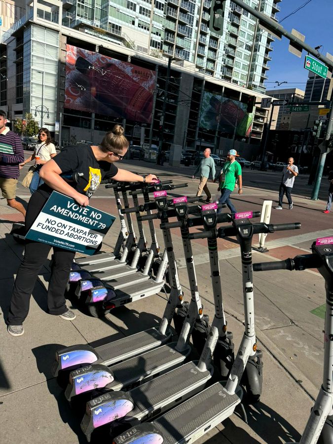 Rebecca Winegar canvassing against Amendment 79 in downtown Denver, October 2024